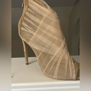 Lightly worn nude bootie heels